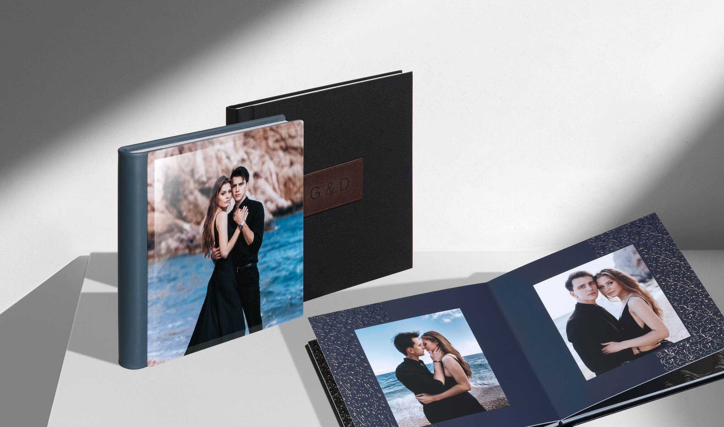 Flush-mount wedding album standing upright with a full-bleed couple portrait