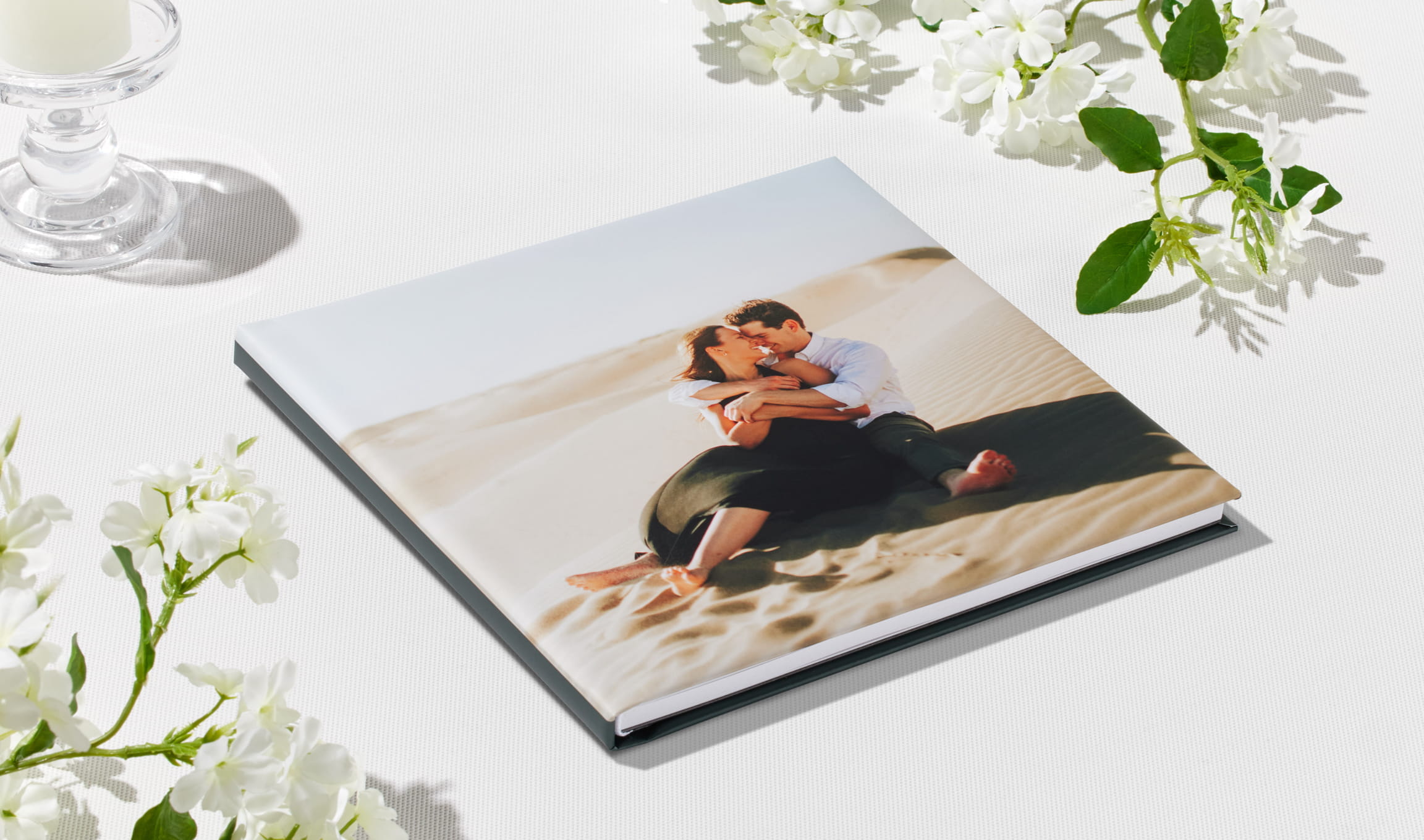 Acrylic-cover layflat wedding album with a printed couple portrait inset